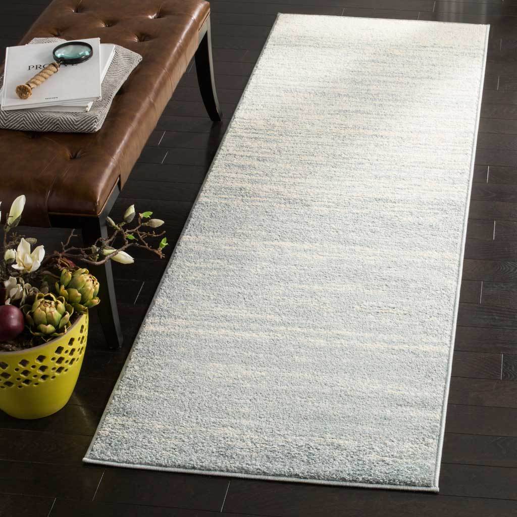 Cream and slate runner rug brings softened, linear texture and cool neutral color underfoot