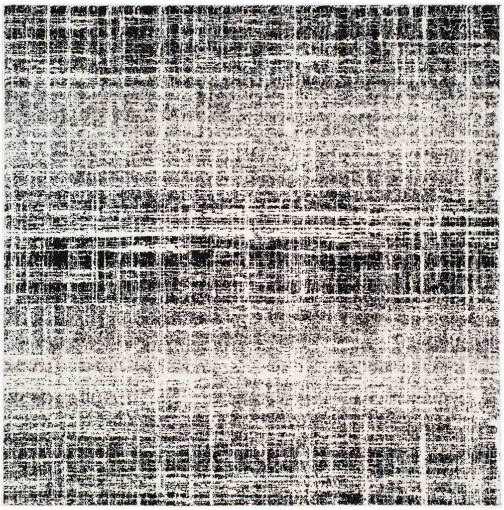 Square ivory and black rug with high-contrast distressed lines and soft horizontal fading