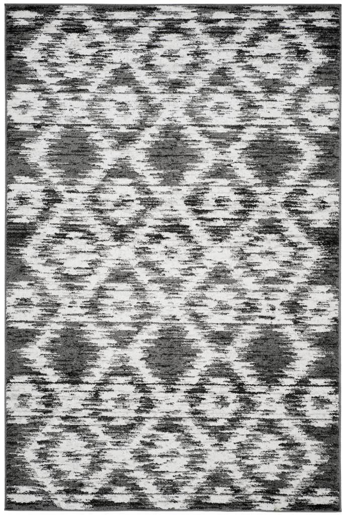 Charcoal and ivory rectangular rug blends outlined diamonds with softly distressed accents