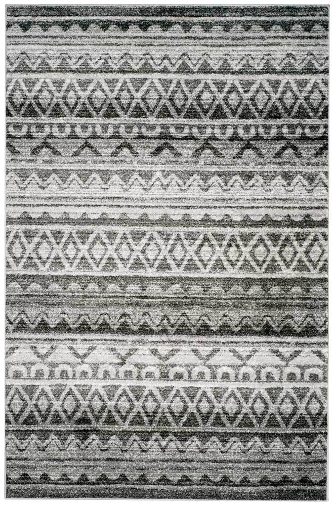 Charcoal diamond bands and fine ivory stripes lend a layered look to this rectangular rug.