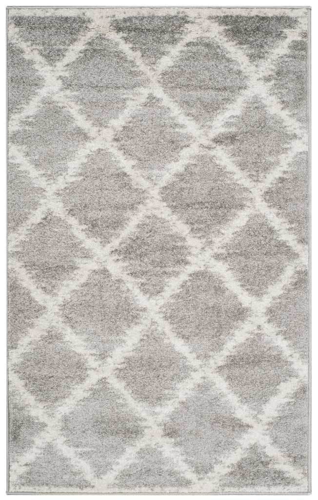Compact silver and ivory rug with oversized distressed diamonds