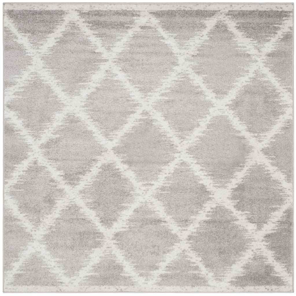 Square rug with mottled silver tones and an ivory diamond lattice