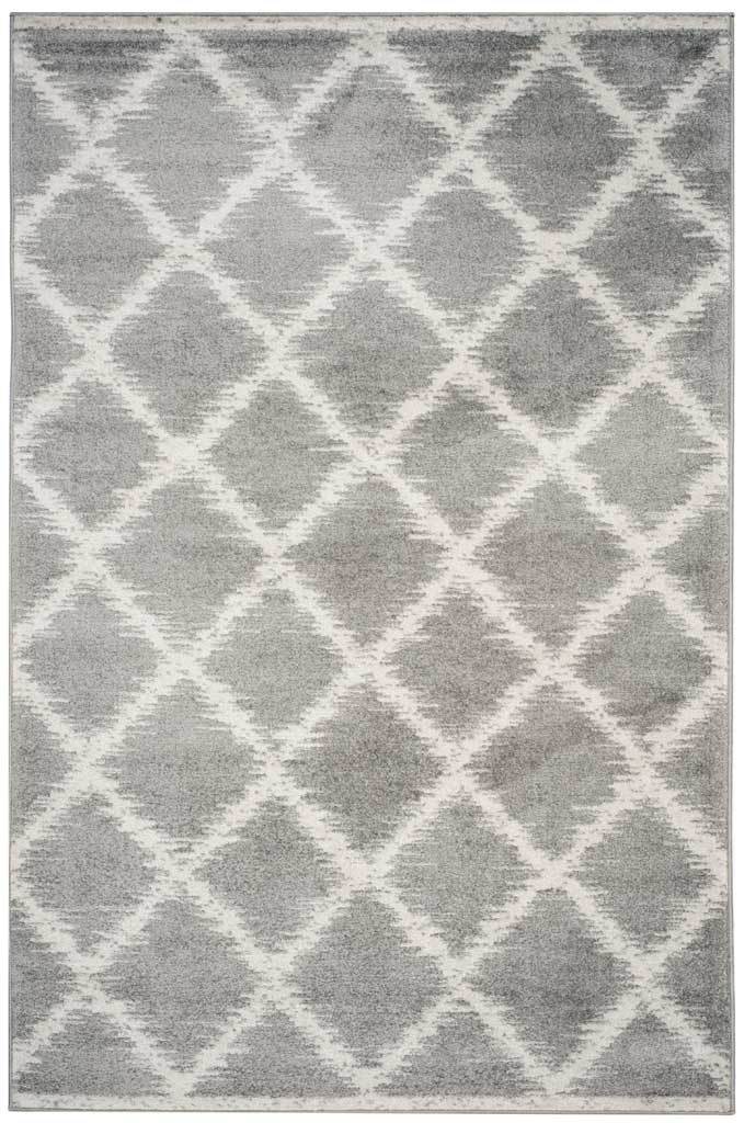 Silver and ivory area rug with overlapping diamonds and a subtly weathered finish