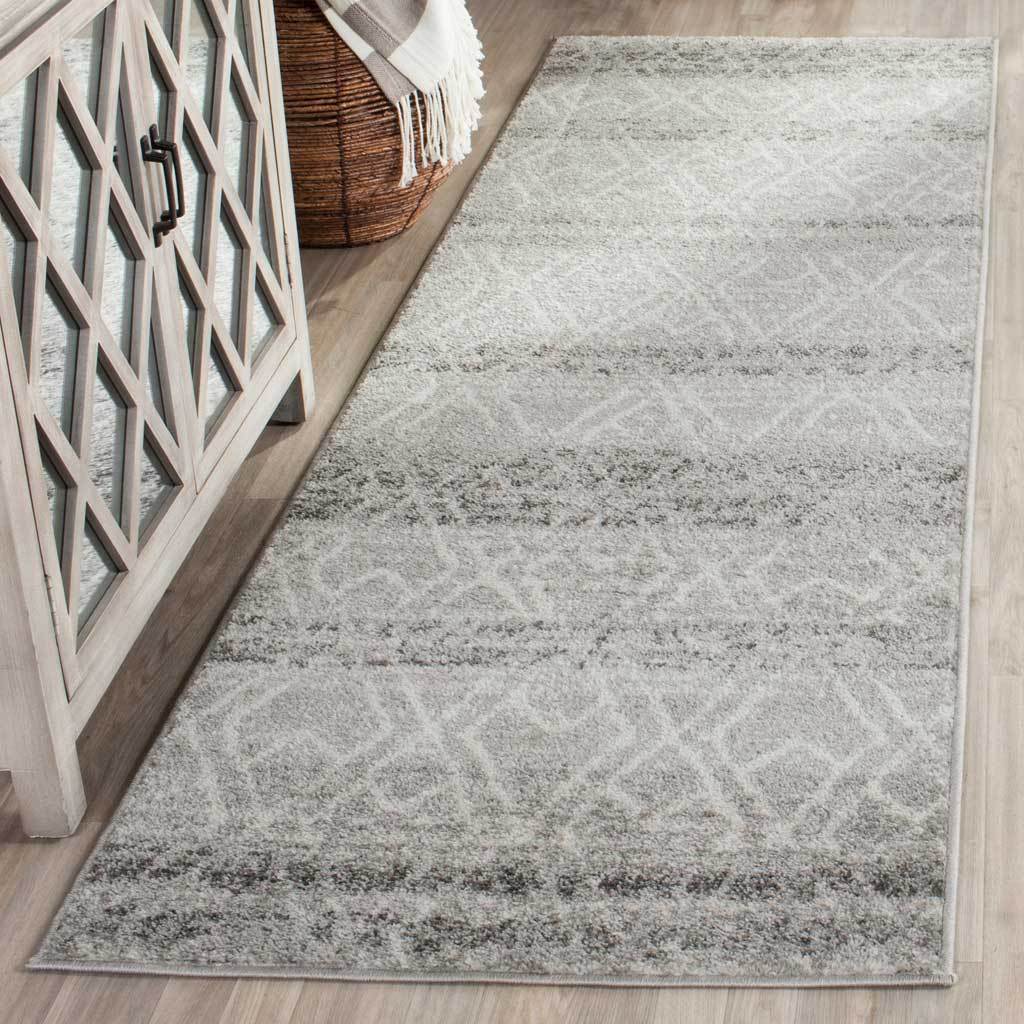 Silver and ivory runner with a faded lattice pattern and subtle tonal striping