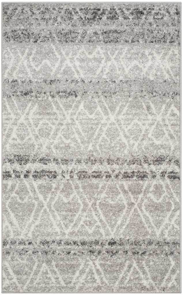Compact silver and ivory rug with a faded geometric lattice and softly shaded stripes