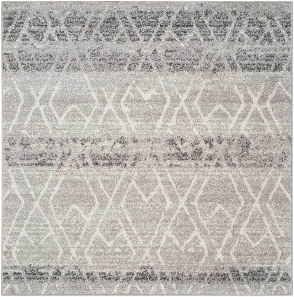 Square silver and ivory rug with an abstract lattice and softly mottled stripes