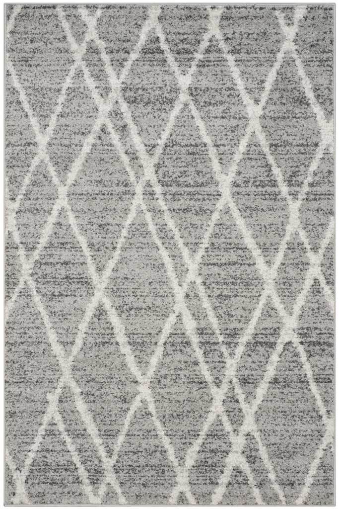 Interlacing ivory diamonds lend geometric energy to this silver-gray rectangular rug.
