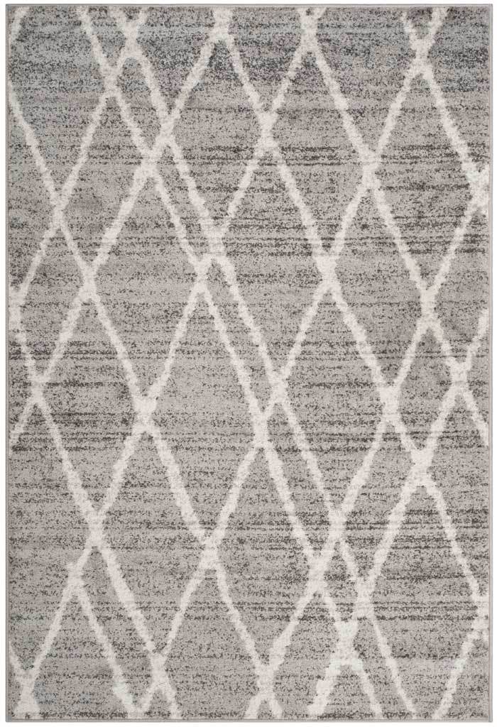 Ivory diamond lines cross the subtly striated surface of this silver-gray rectangular rug.