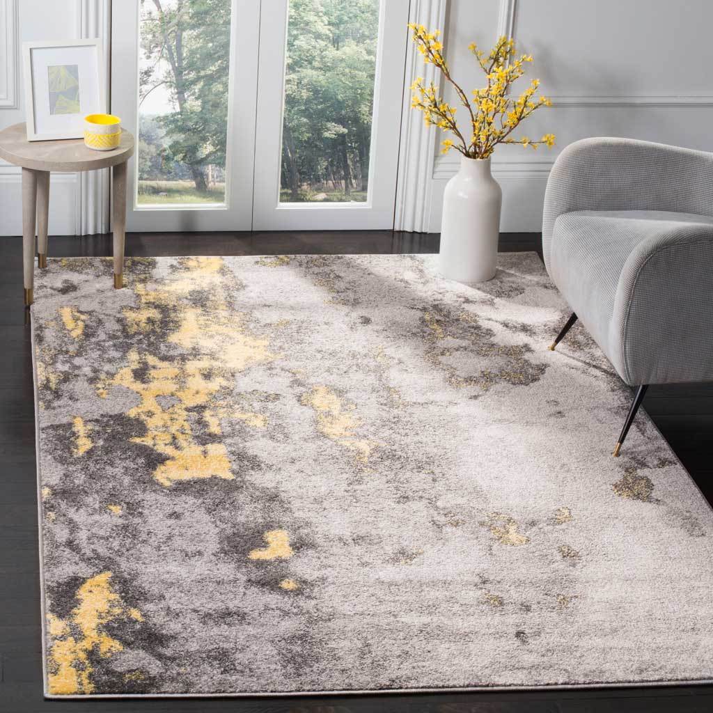 Gray and yellow abstract rug adds energetic color to a contemporary seating area.
