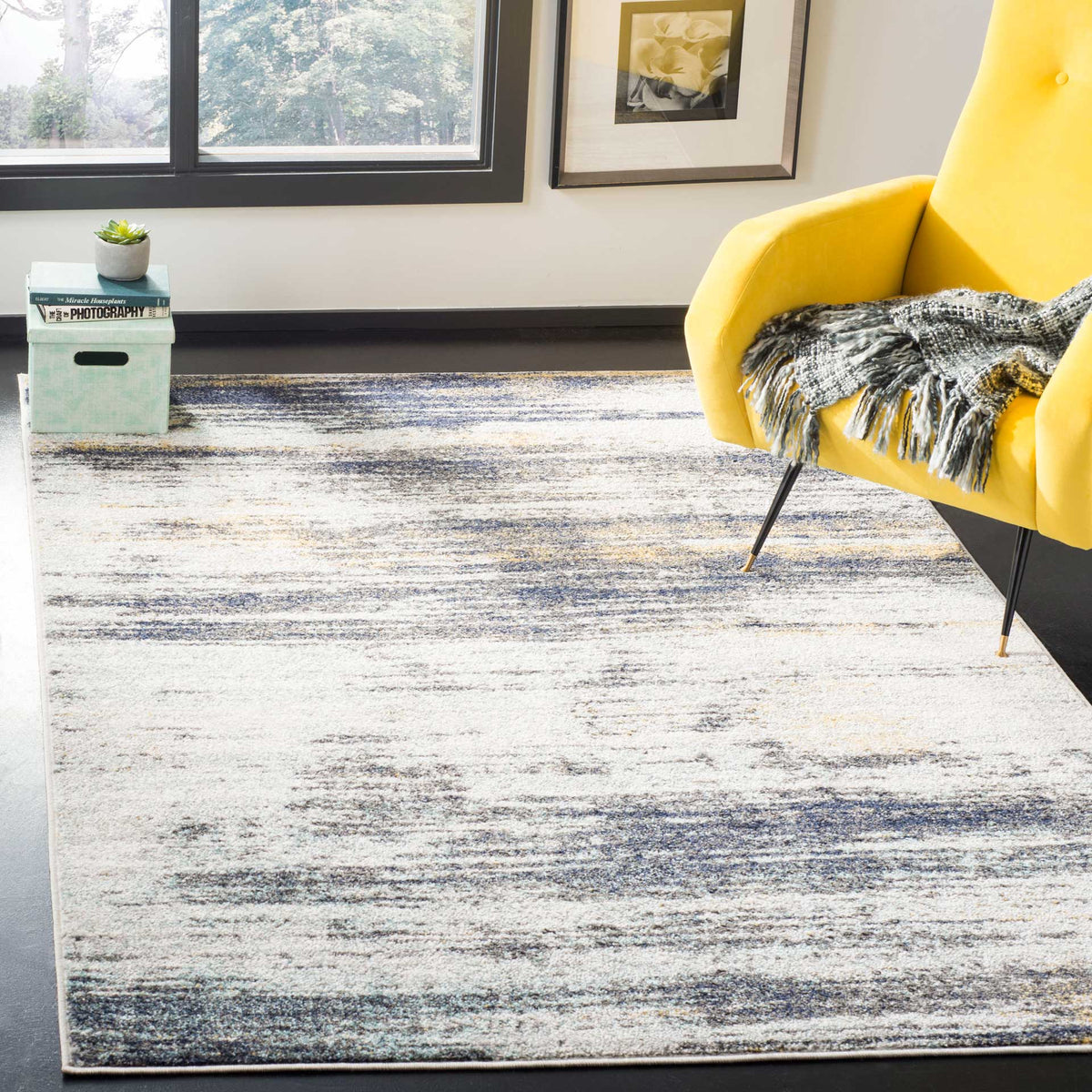 Layered gray and black striations lend modern contrast to a relaxed living space