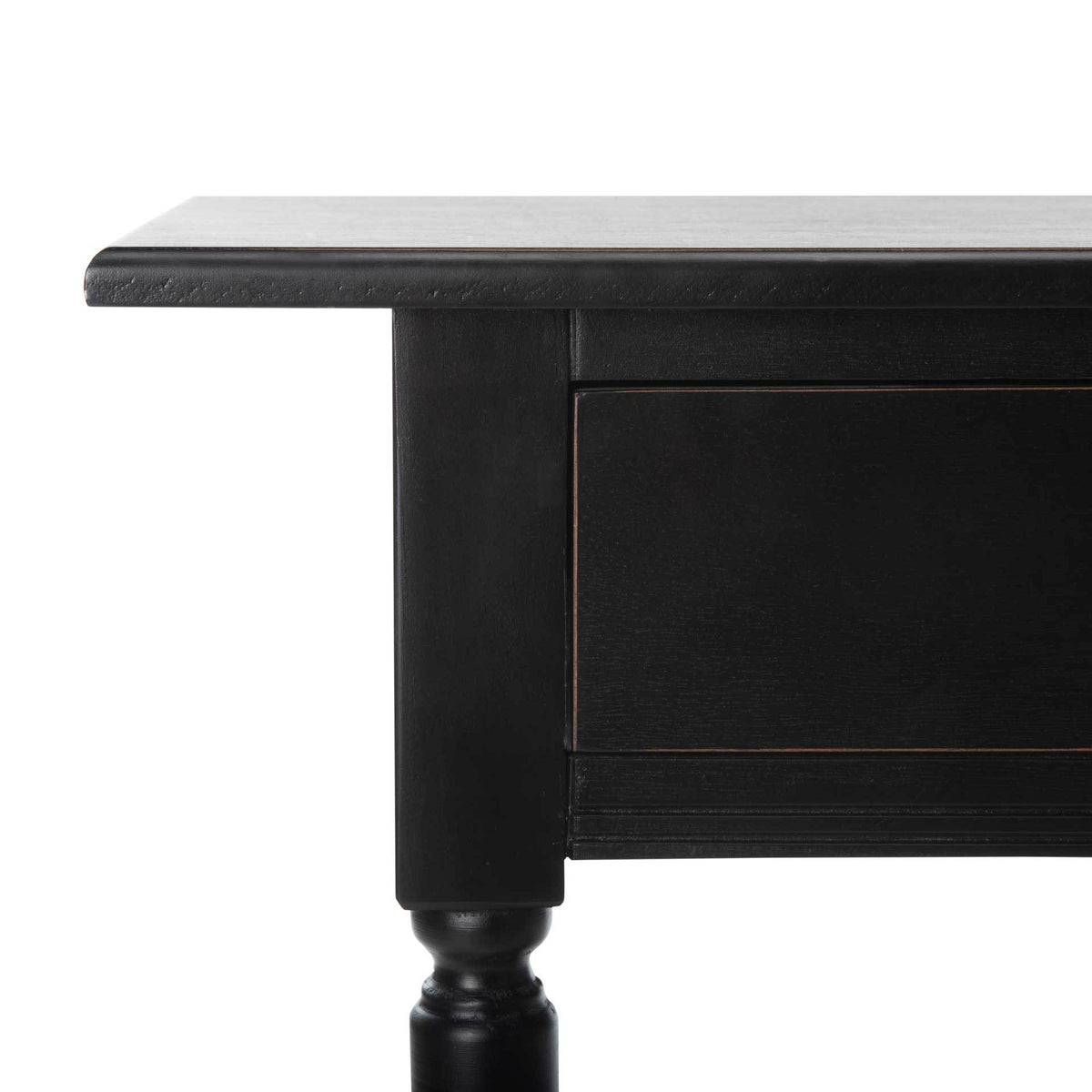 A softly rounded tabletop edge and subtle woodgrain enrich the distressed black finish