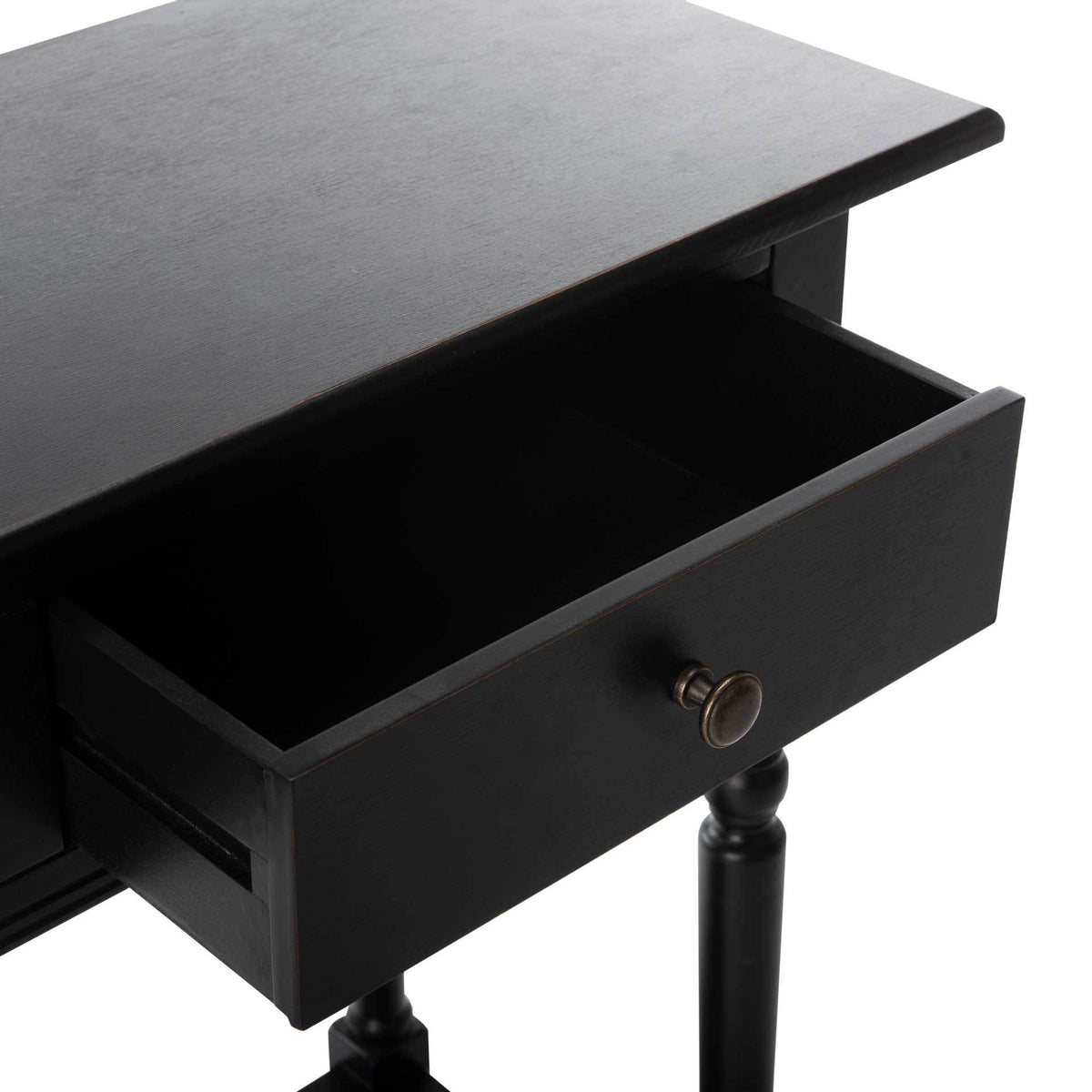 An open drawer reveals roomy storage beneath the console's black tabletop