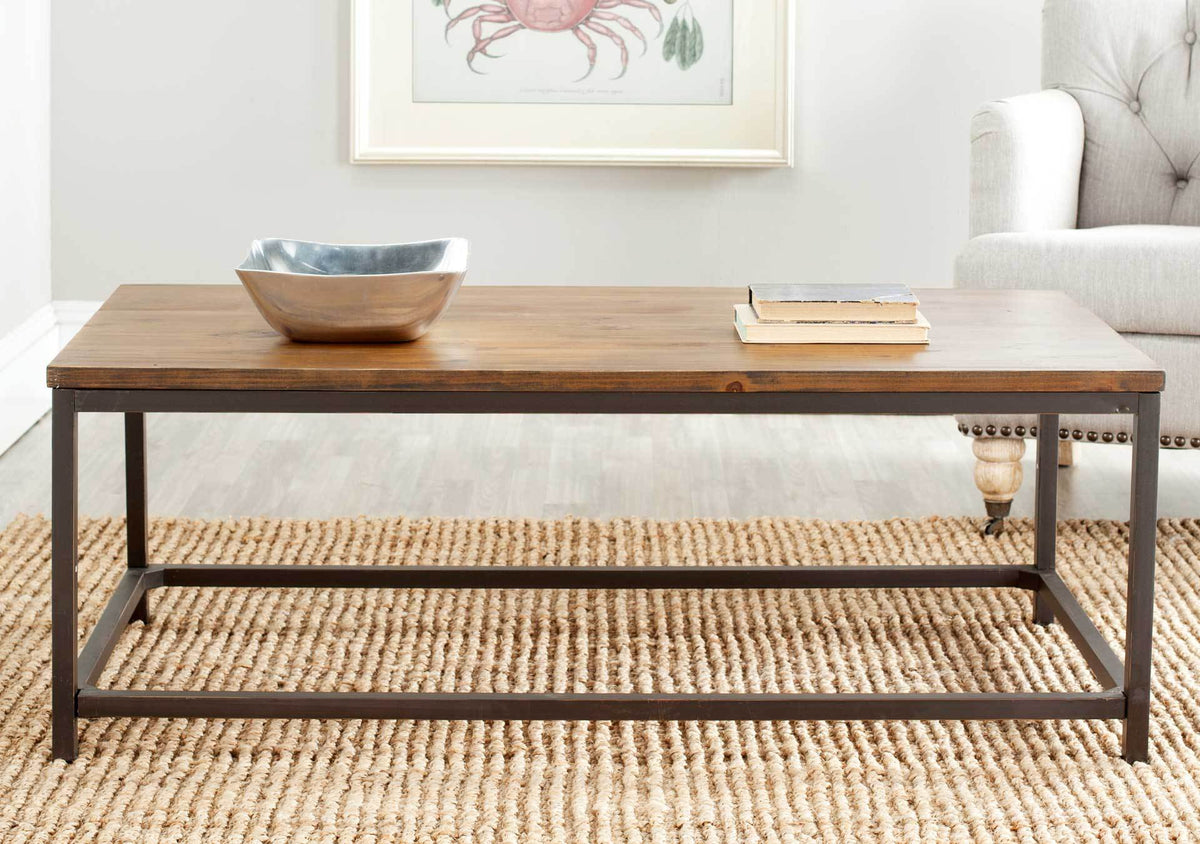 Brown wood tabletop and open iron base bring understated warmth to the living room.