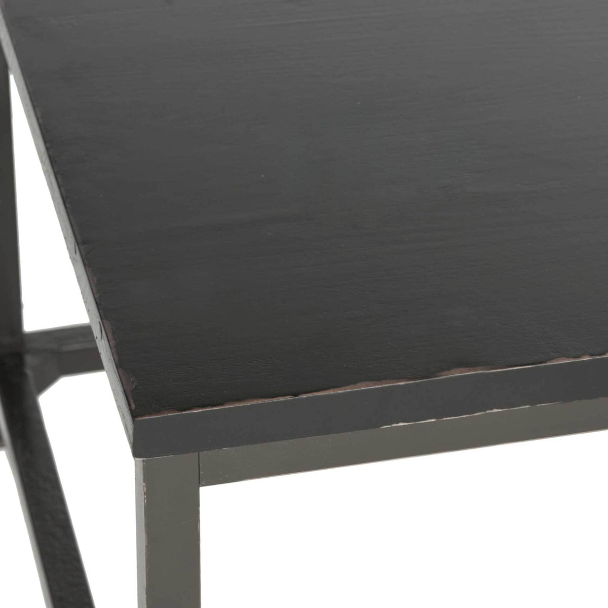 Subtle wood grain and distressed edges add depth to the near-black tabletop.