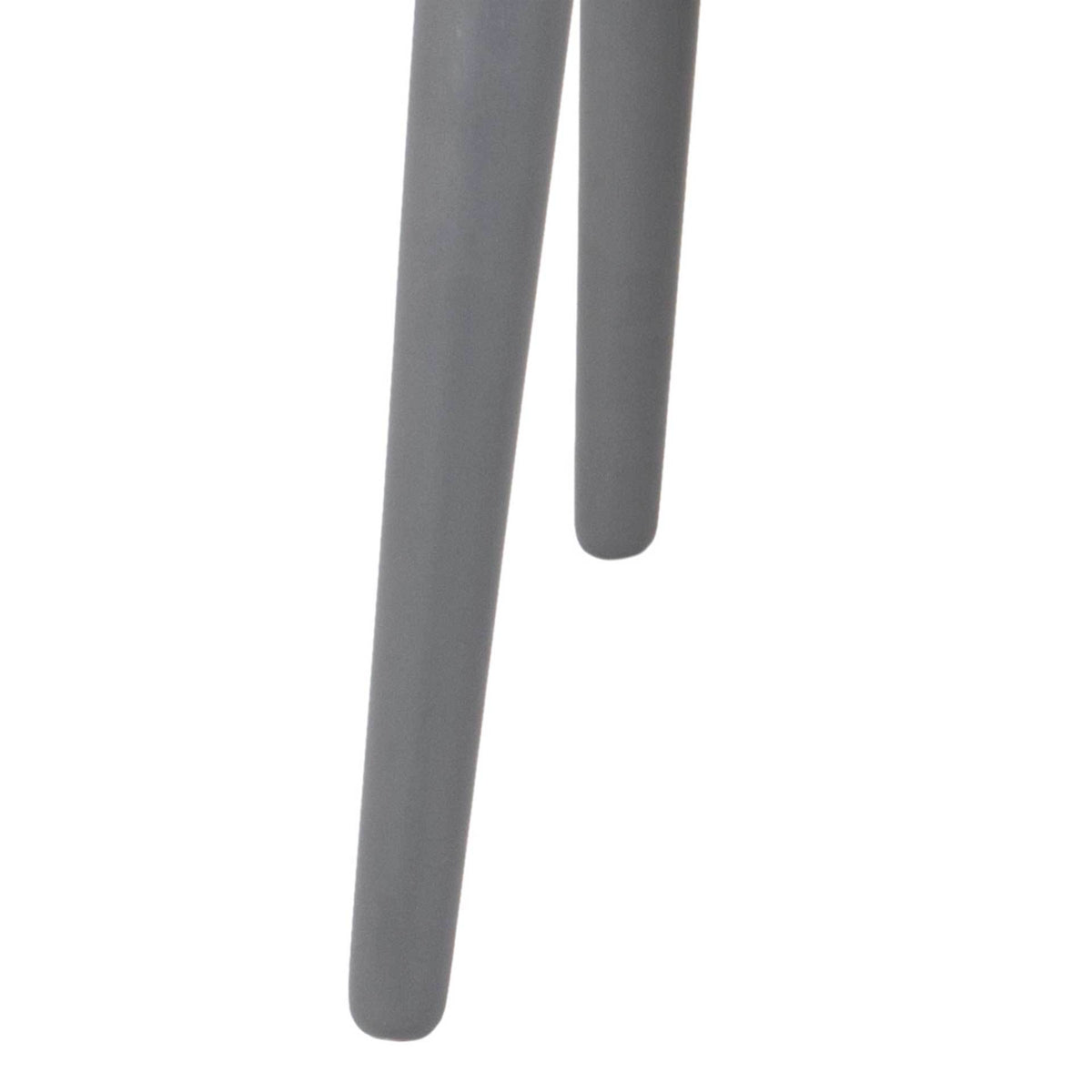 Tapered gray wood legs give the chair a light, balanced stance.