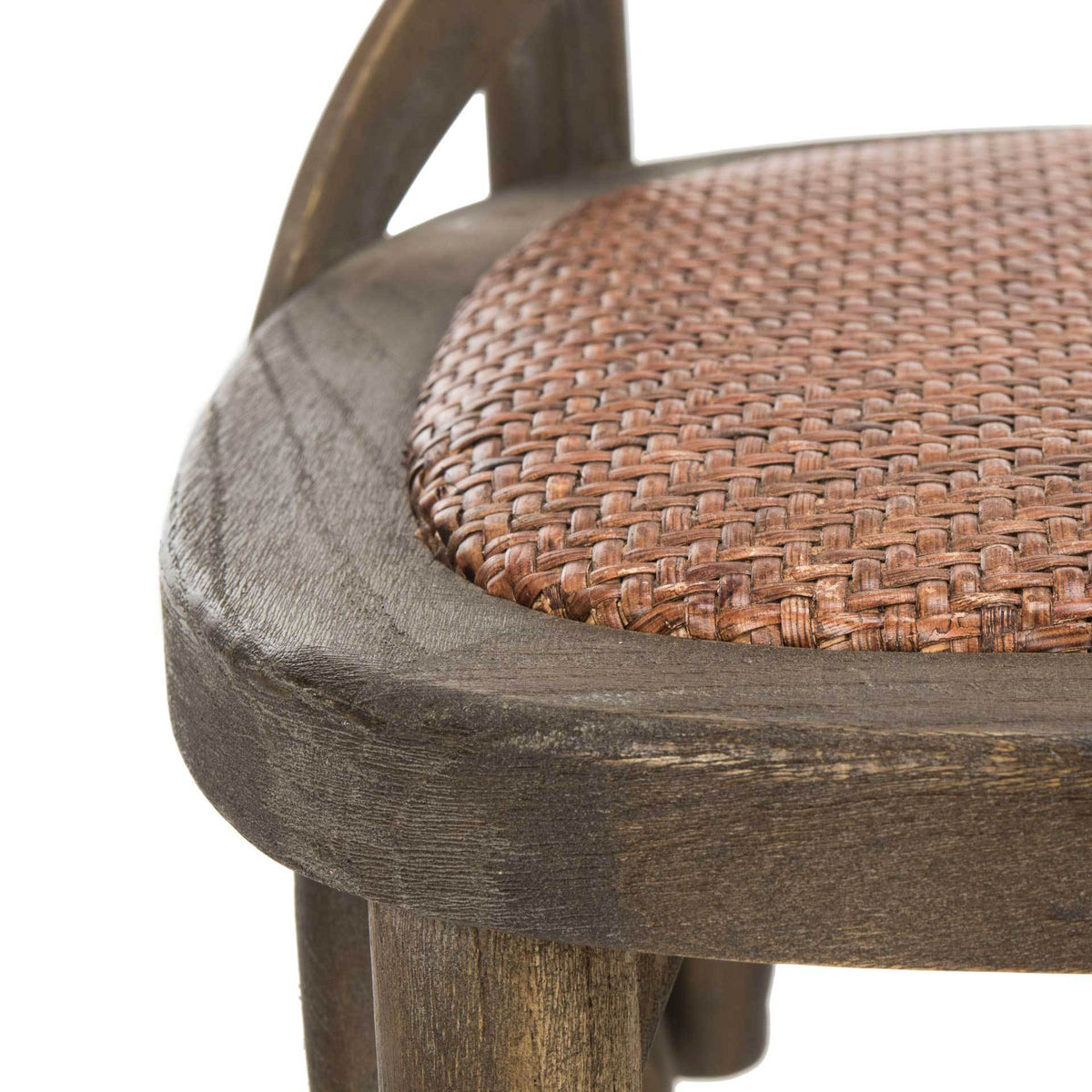 Tightly woven brown rattan adds rich texture inside the weathered gray oak seat frame