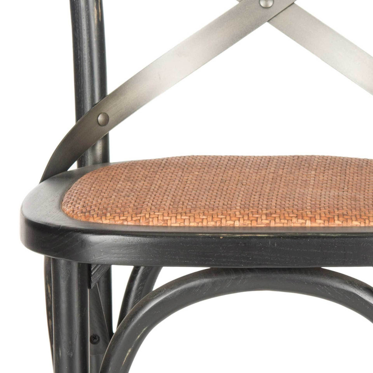 Warm woven rattan contrasts with a distressed black wood seat frame and metal cross braces