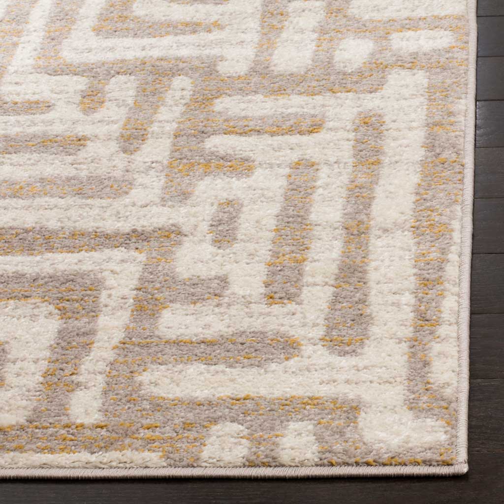 Soft ivory pile meets muted mauve patterning and a neatly bound edge.
