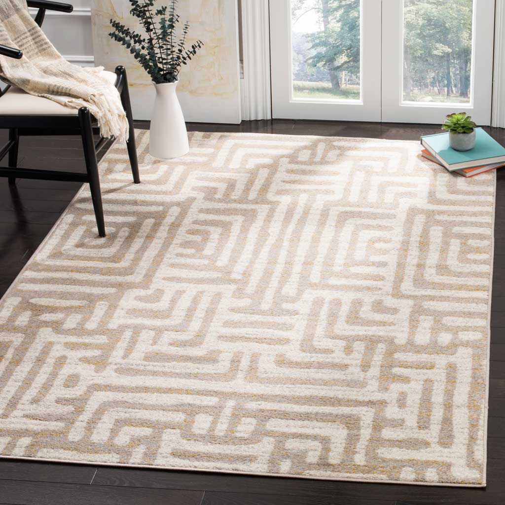 An airy ivory rug with mauve geometric lines brings soft pattern to a bright living space.