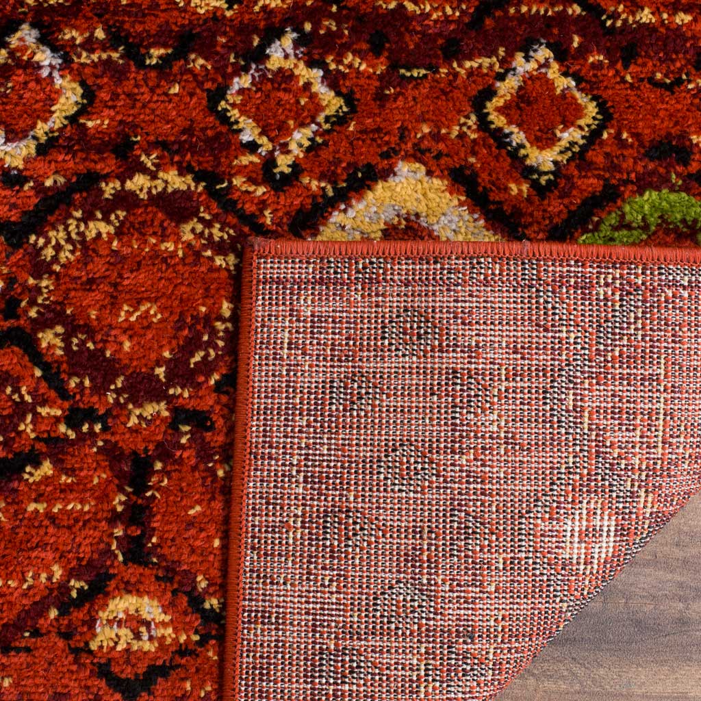 Terracotta rug's colorful pile pairs with a tightly woven jute backing and finished edge