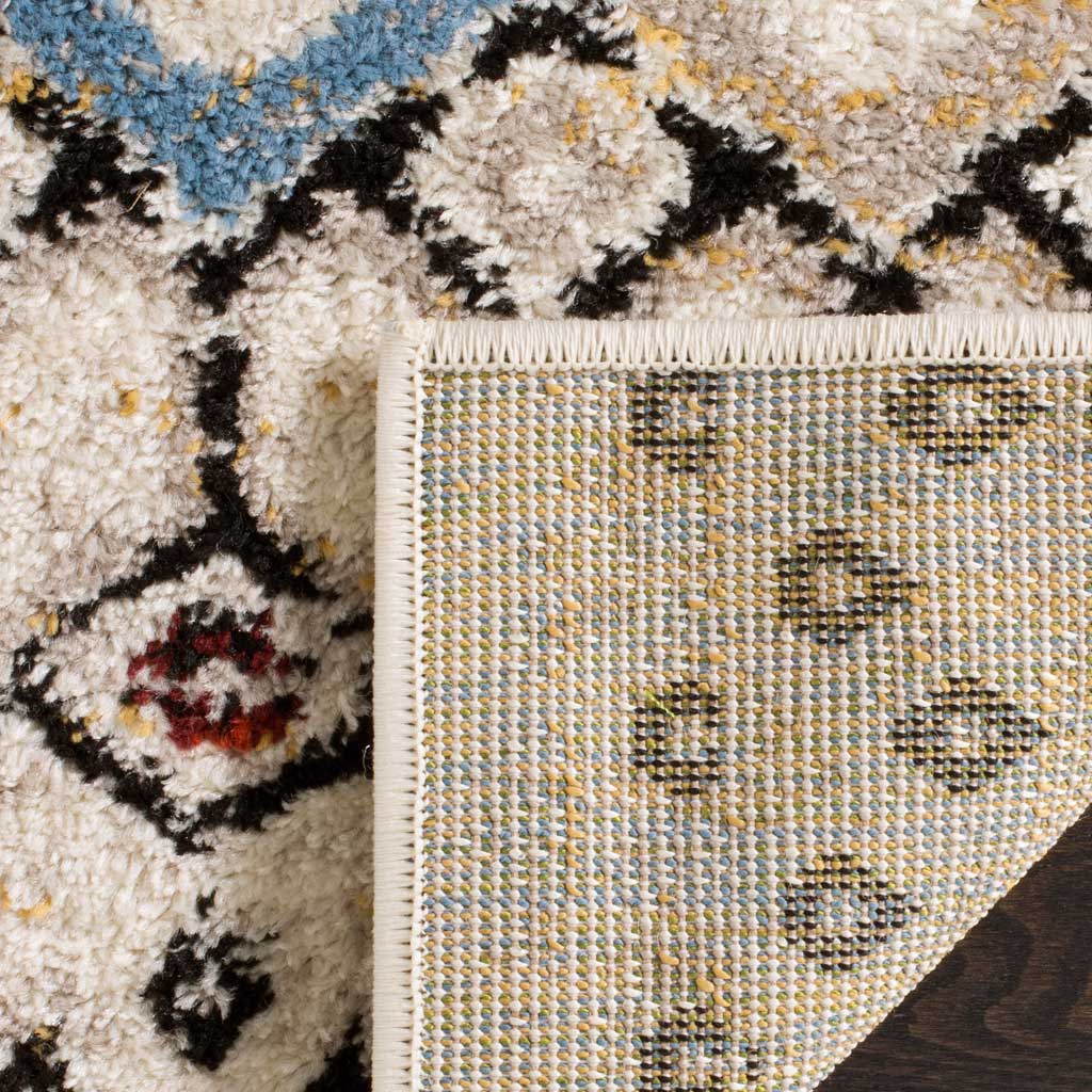 Tightly woven jute backing complements the ivory rug's colorful pile and bound edge
