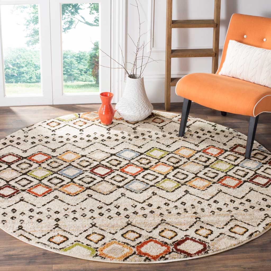 Lively multicolor diamonds give this round ivory rug a fresh, inviting feel