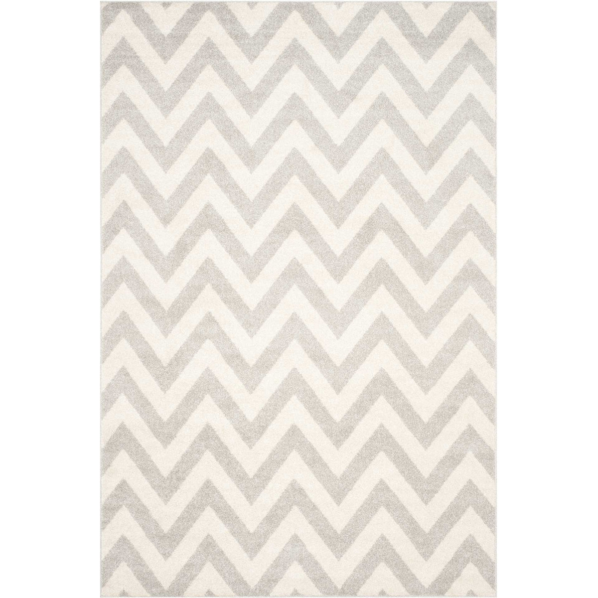 Subtle gray and beige chevrons flow across a rectangular rug with an easy modern feel.