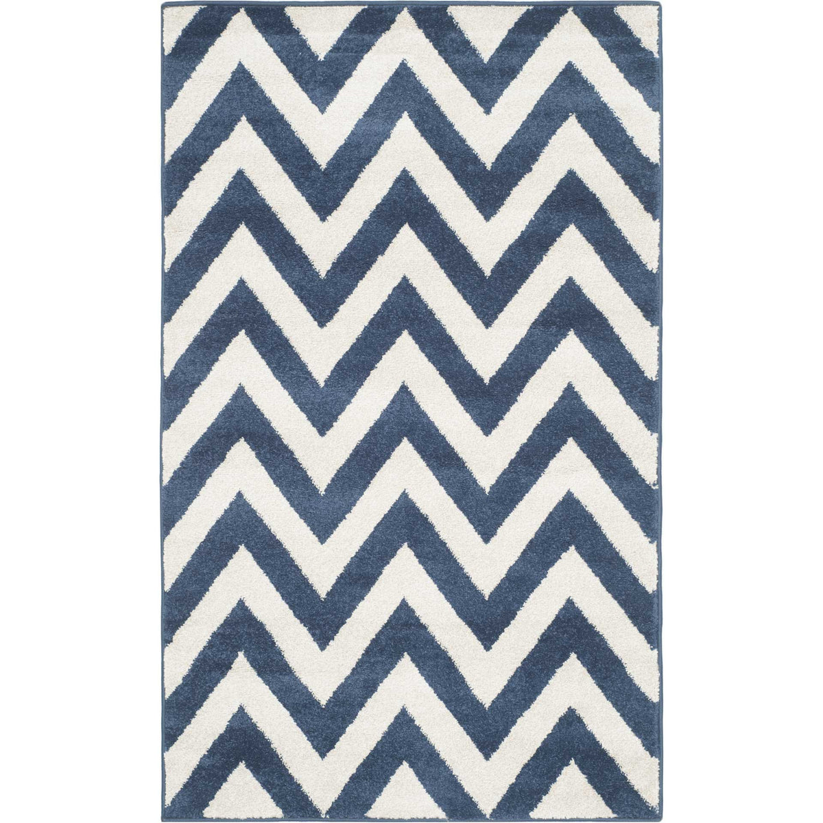 Deep navy and beige chevrons give this smaller rug a lively, modern rhythm.