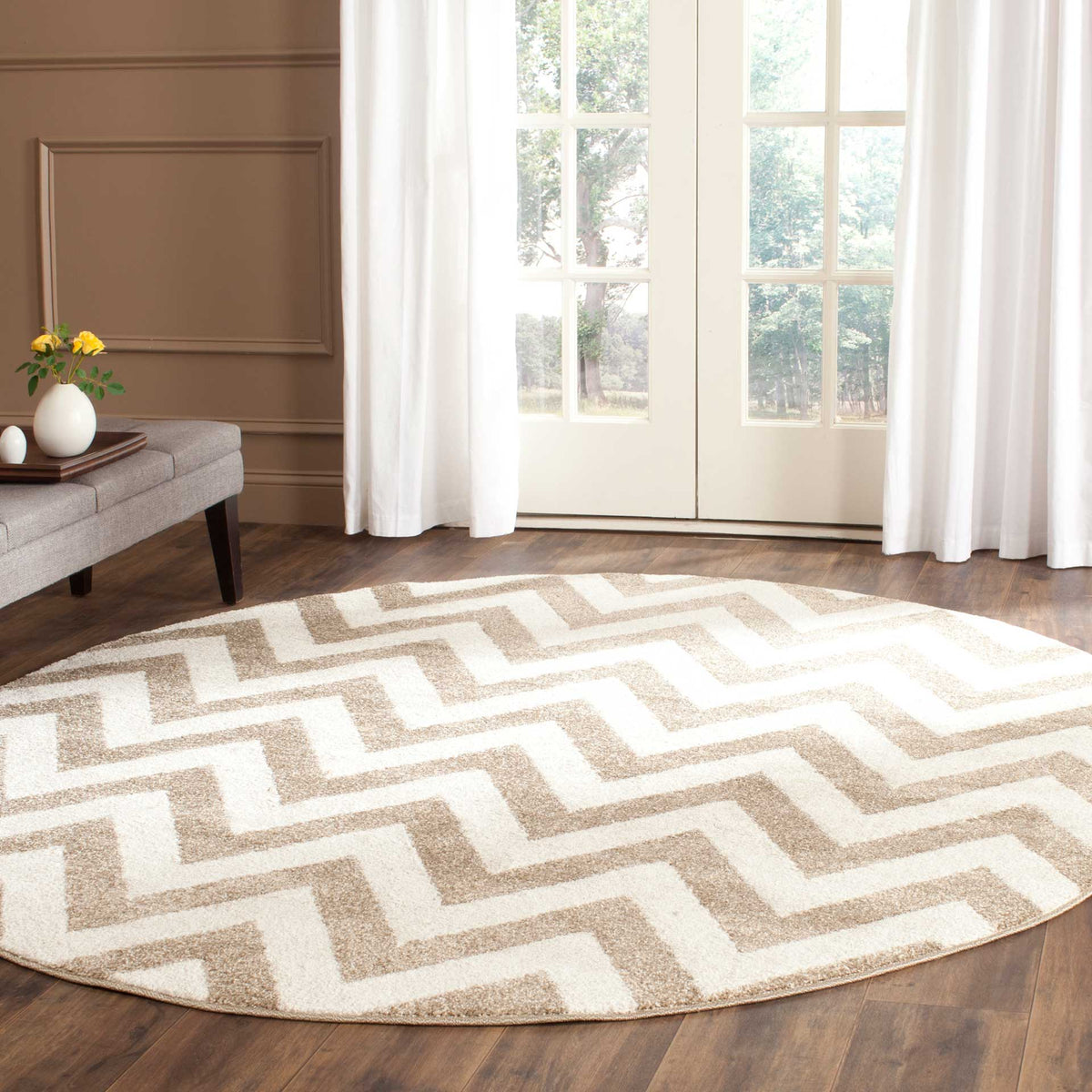 Warm wheat zigzags add inviting texture to this round rug on hardwood floors.