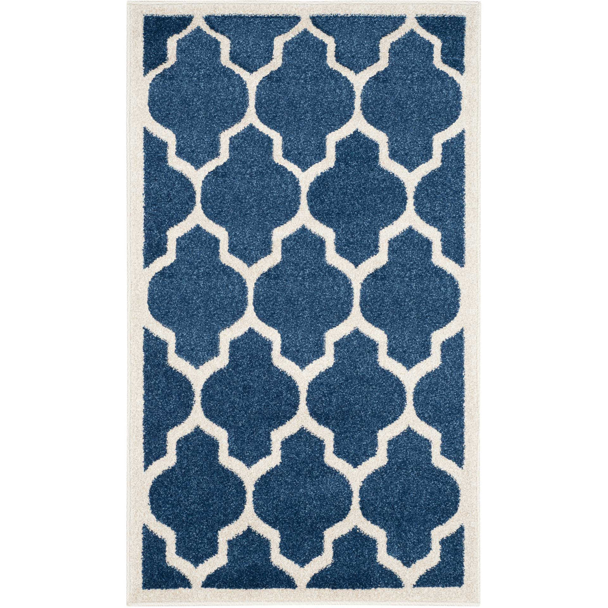 Compact navy accent rug with striking beige lattice lines and pale edging