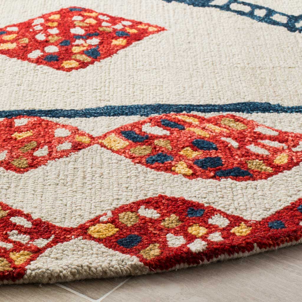 Textured wool pile highlights red, yellow, and navy motifs along a neatly finished edge