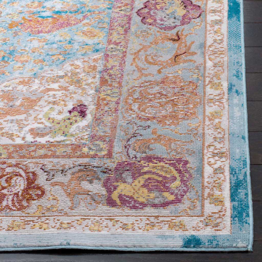 A turquoise edge frames orange scrollwork and purple floral details.