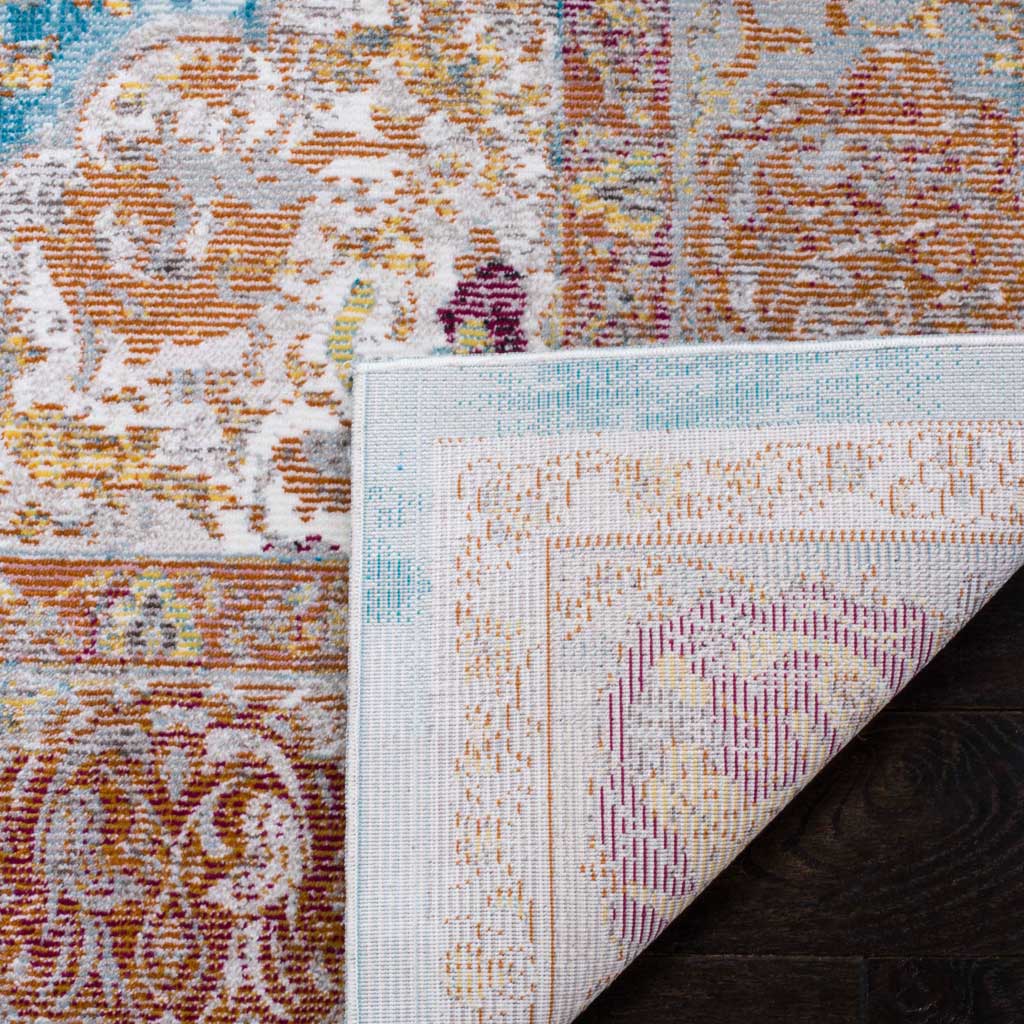 A folded corner reveals the woven underside beneath the colorful floral pattern.