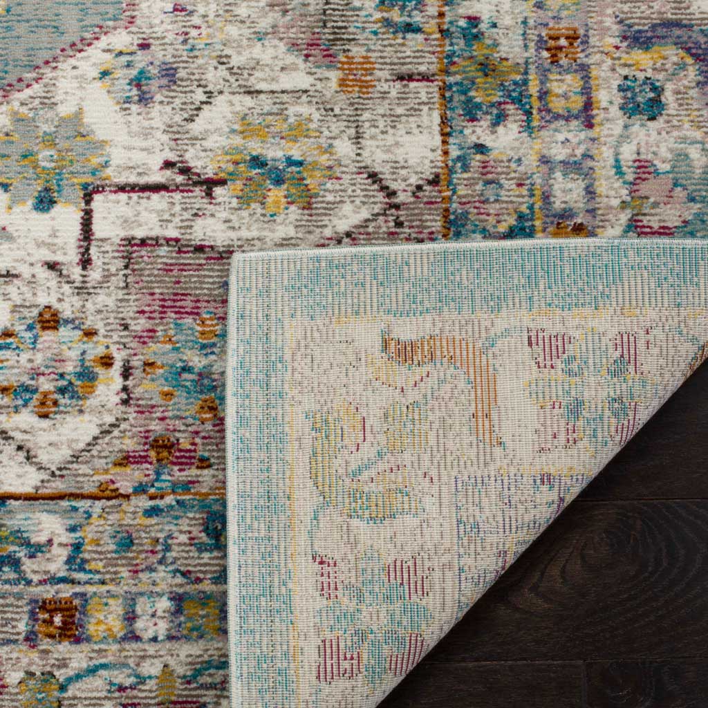 A woven underside reveals subtle traces of the green, pink, and cream floral design.