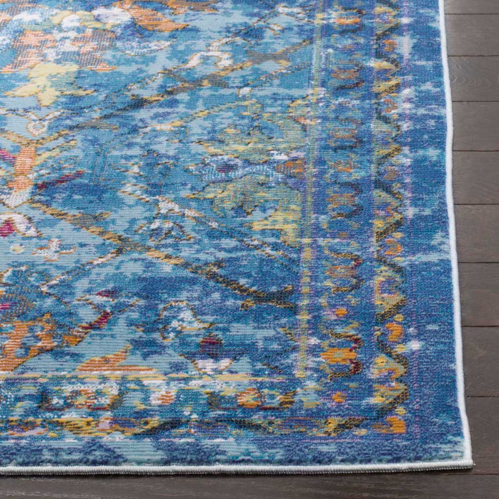 Blue, gold, and coral motifs meet a patterned border and neatly bound edge