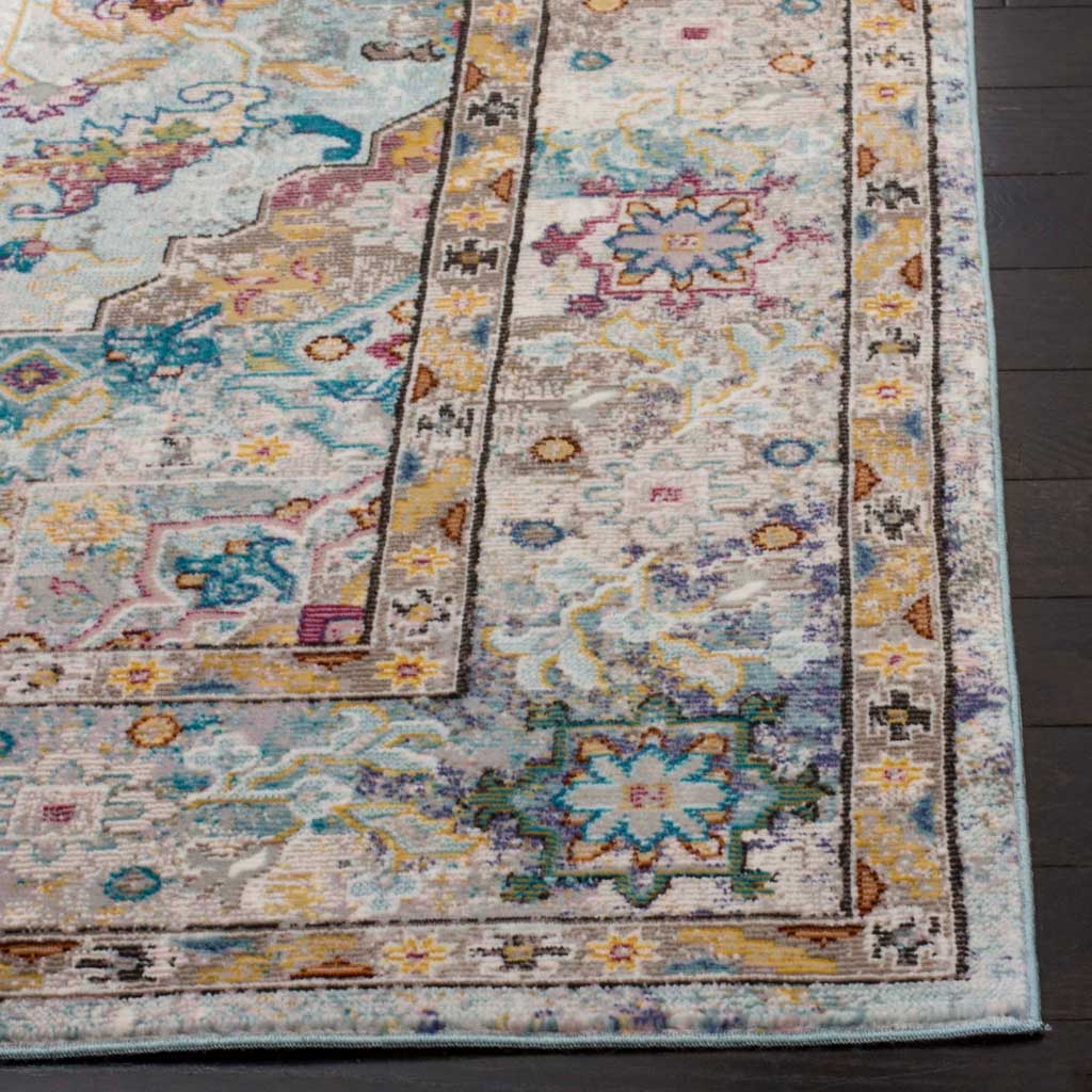 Colorful floral motifs and a layered border meet a neatly finished rug edge