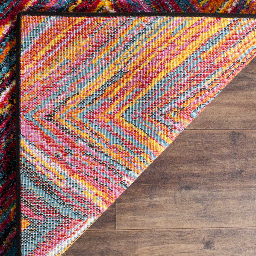 A folded corner reveals colorful woven backing and a neatly finished edge.