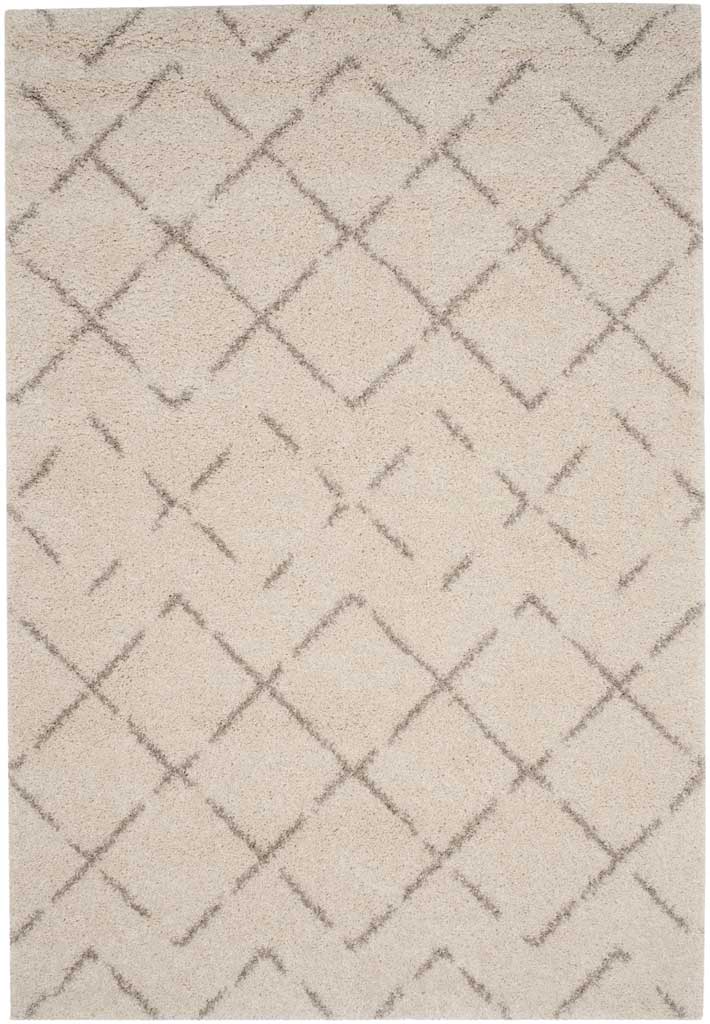 Pale ivory shag is traced with fine beige diagonal lines and open diamonds.