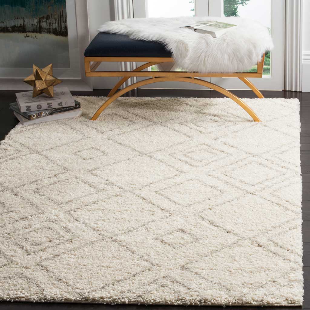 Ivory shag and faint beige diamond lines lend subtle pattern and warmth beneath a bench.