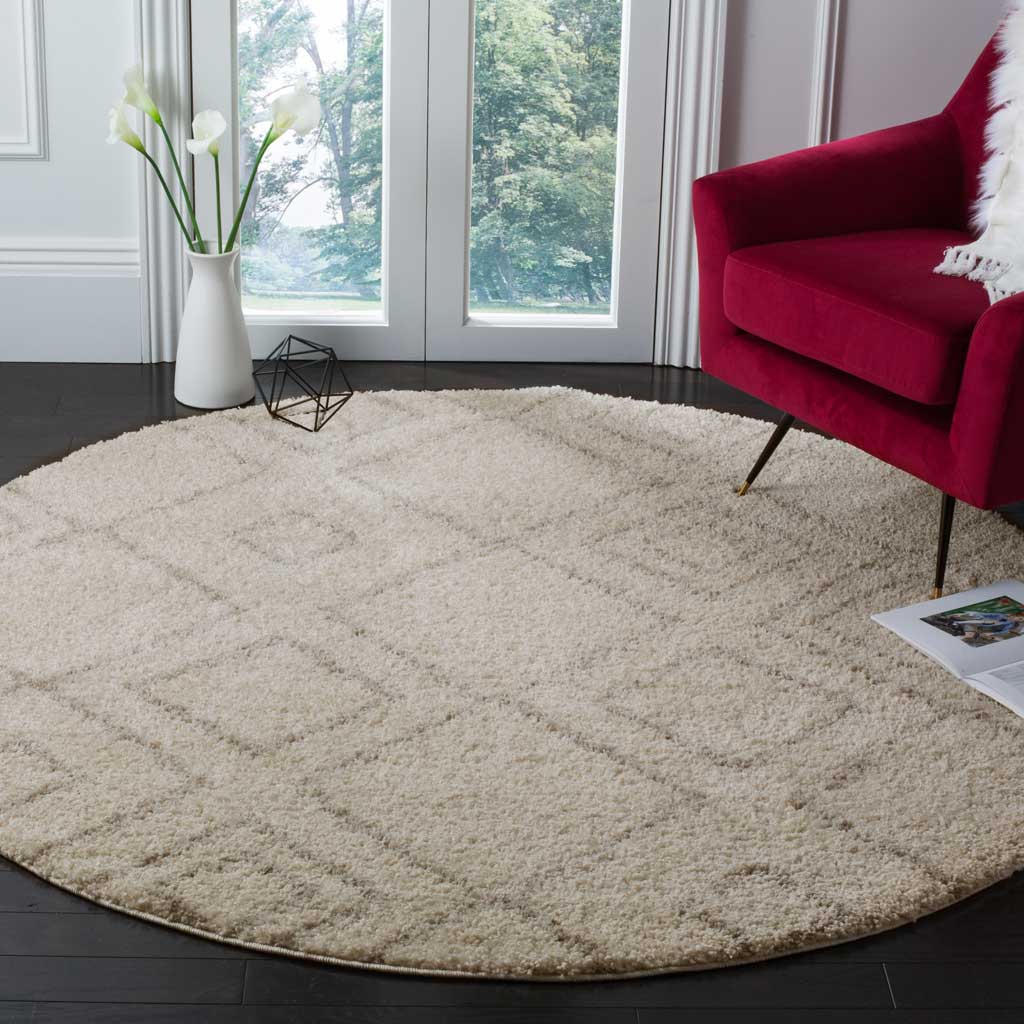 Soft ivory and beige shag lends understated geometric style to a bright seating area