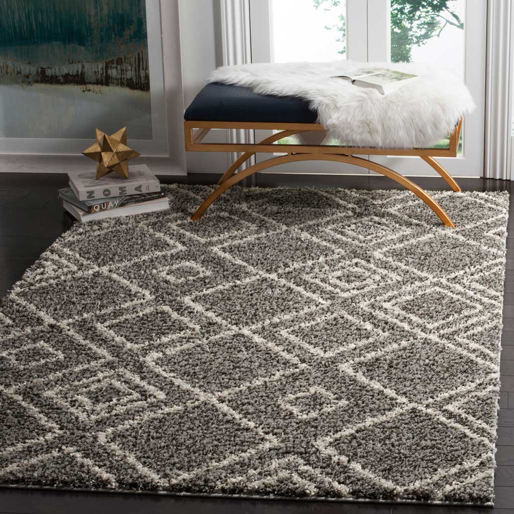 Brown and ivory diamond-patterned shag adds a cozy foundation beneath a cushioned bench.