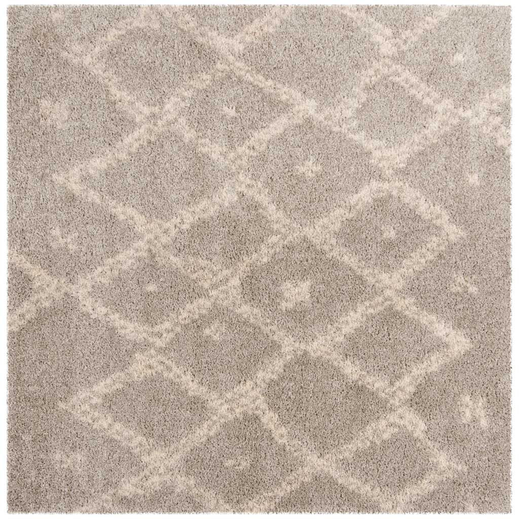 Square gray and ivory shag rug features an irregular network of softly outlined diamonds.