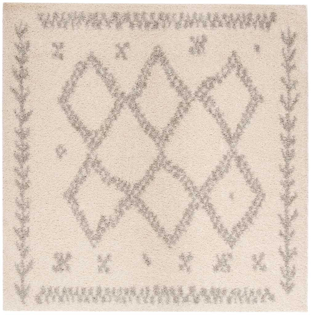 Square ivory rug centers gray interlocking diamonds within delicate leafy borders.