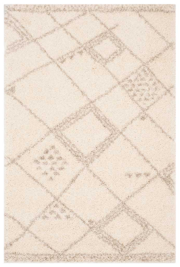 Ivory and gray shag rug balances roomy diagonal diamonds with subtle dotted accents.
