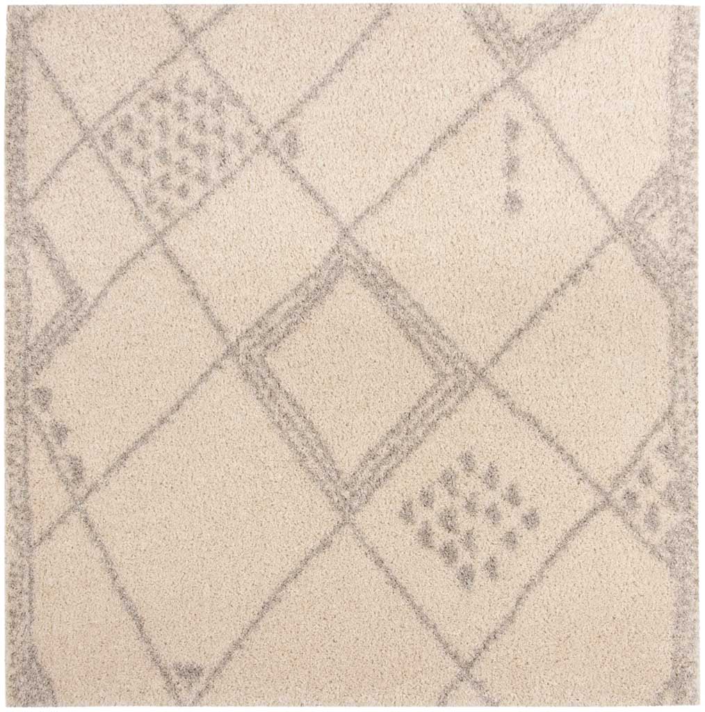 Square ivory shag rug combines a gray diamond grid with small speckled details.