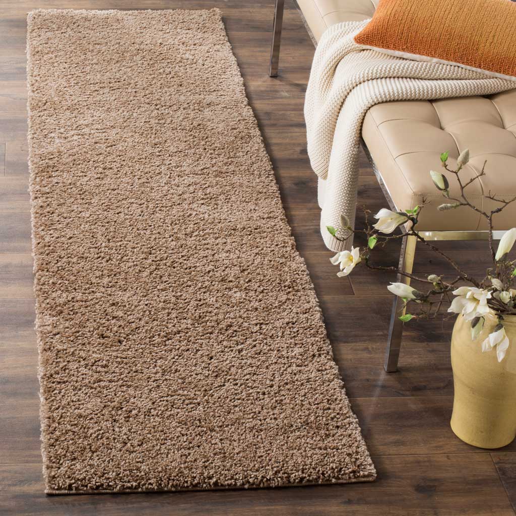 Thick taupe shag gives this simple runner inviting depth and softness.