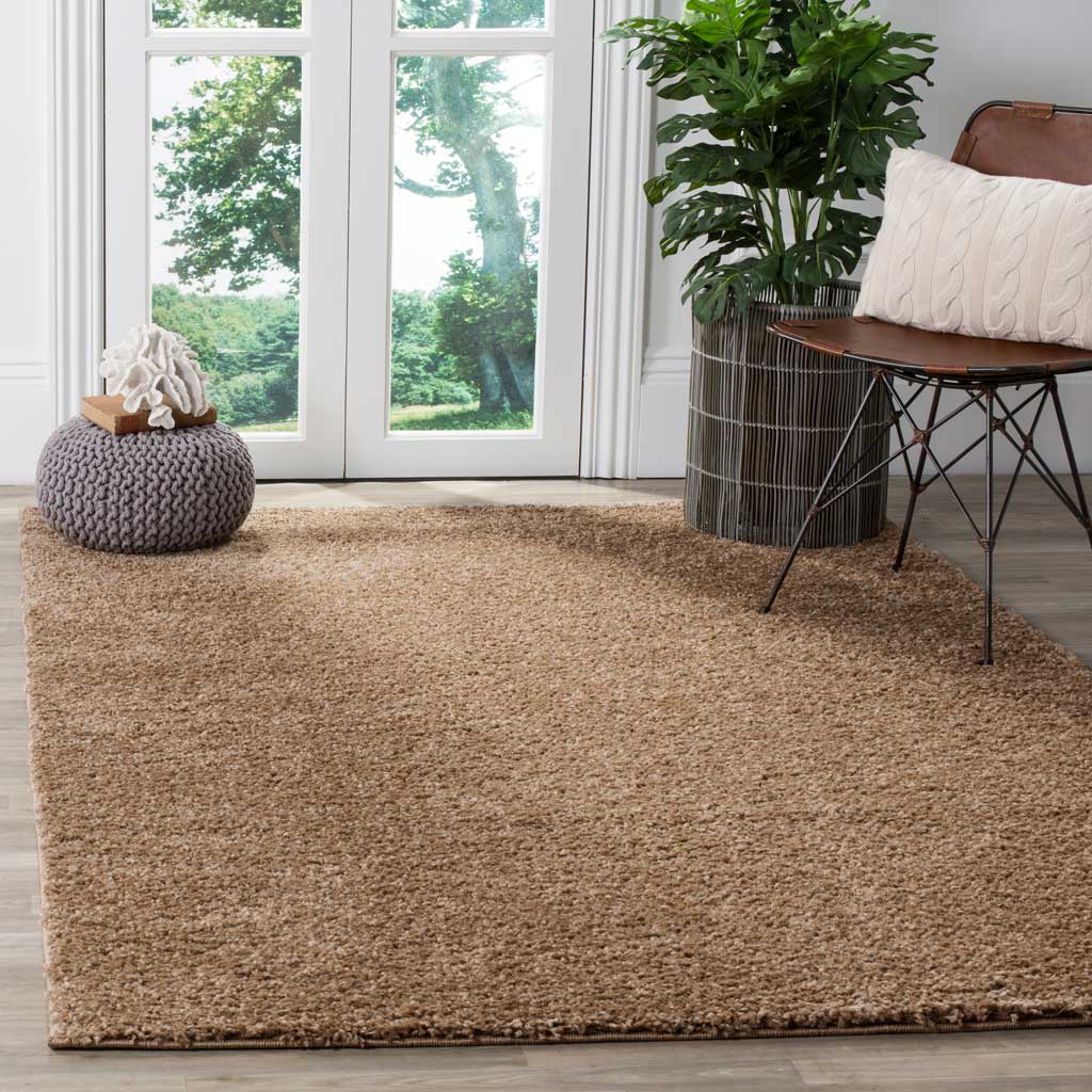 Warm taupe shag creates a soft, inviting foundation in a bright seating area.