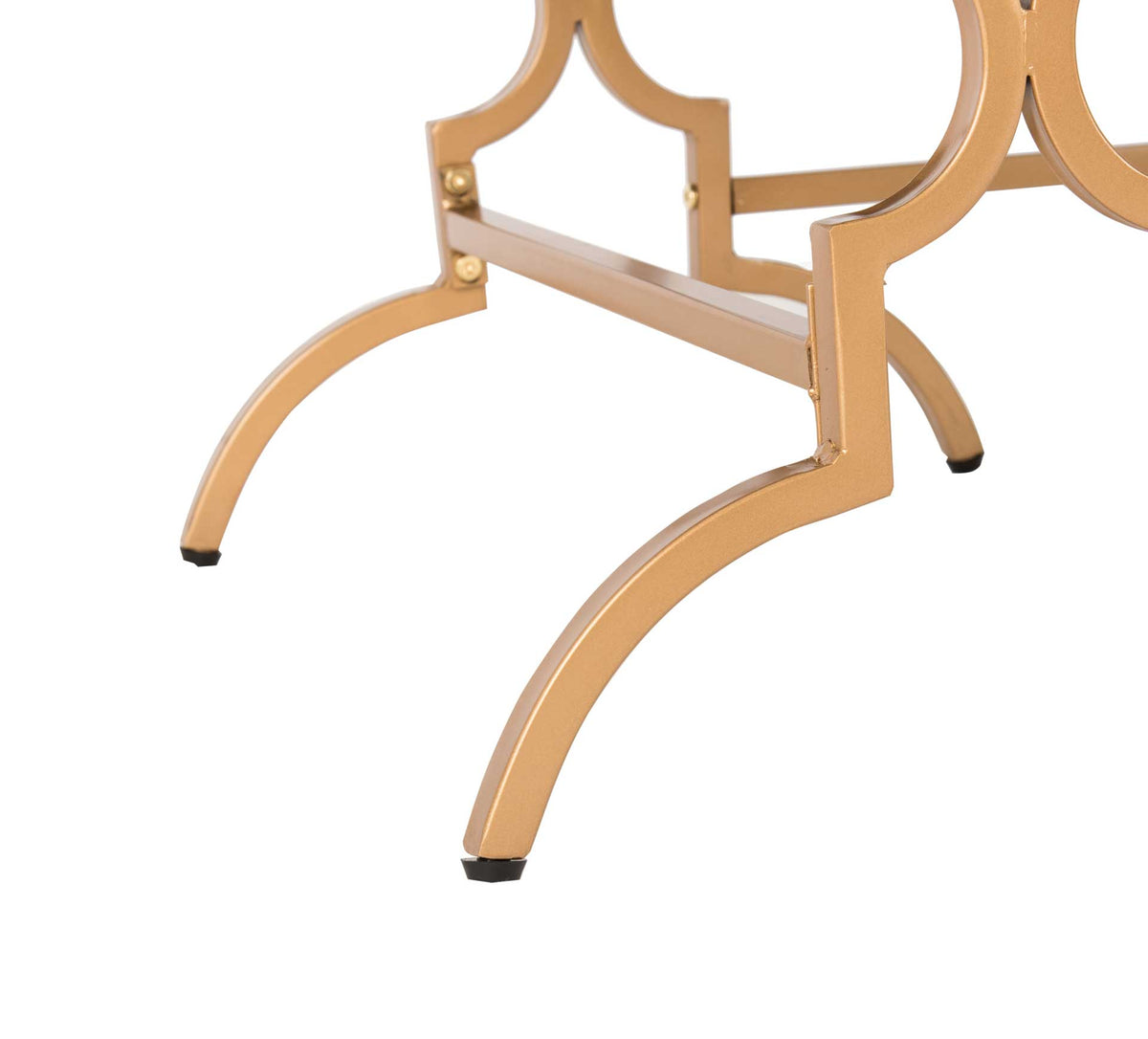 Sweeping gold metal legs and open braces create a graceful, airy foundation