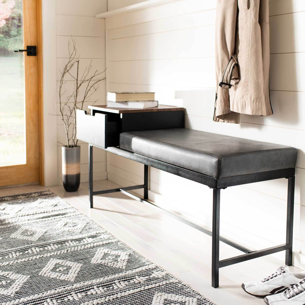 An entryway bench pairs a gray cushioned seat with an open drawer and a handy woodgrain ledge