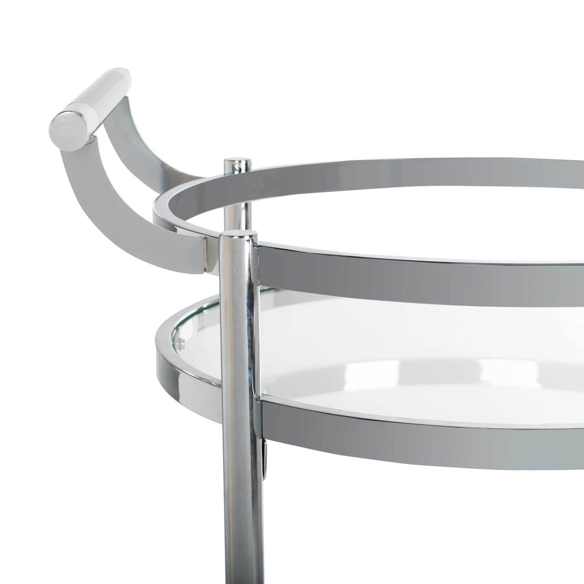 A sweeping chrome handle rises above the polished rim and clear glass upper tier